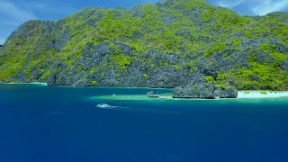 El Nido Paradise: A Beautiful Picture of Nature with Blue Sea, Green Mountains and White Sand.