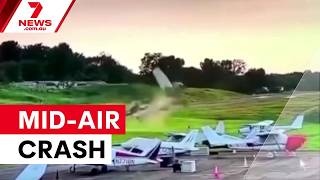 Pilot killed in mid-air crash with police helicopter | 7NEWS