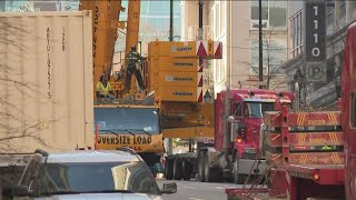 Contractors work to dismantle unstable crane in Midtown Atlanta, impact on traffic