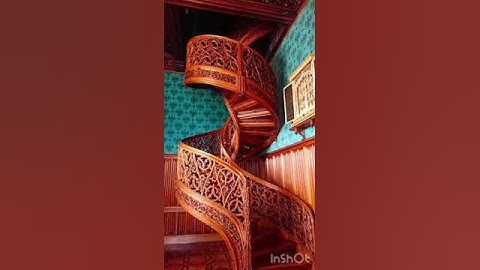 World History- Spiral staircase carved tree from 1851 a library Lednice castle, Czech republic.
