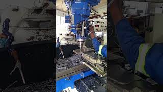 DRILLING WITH END MILL ON UNIVERSAL MILLING MACHINE IN MANUFACTURING WORKSHOP