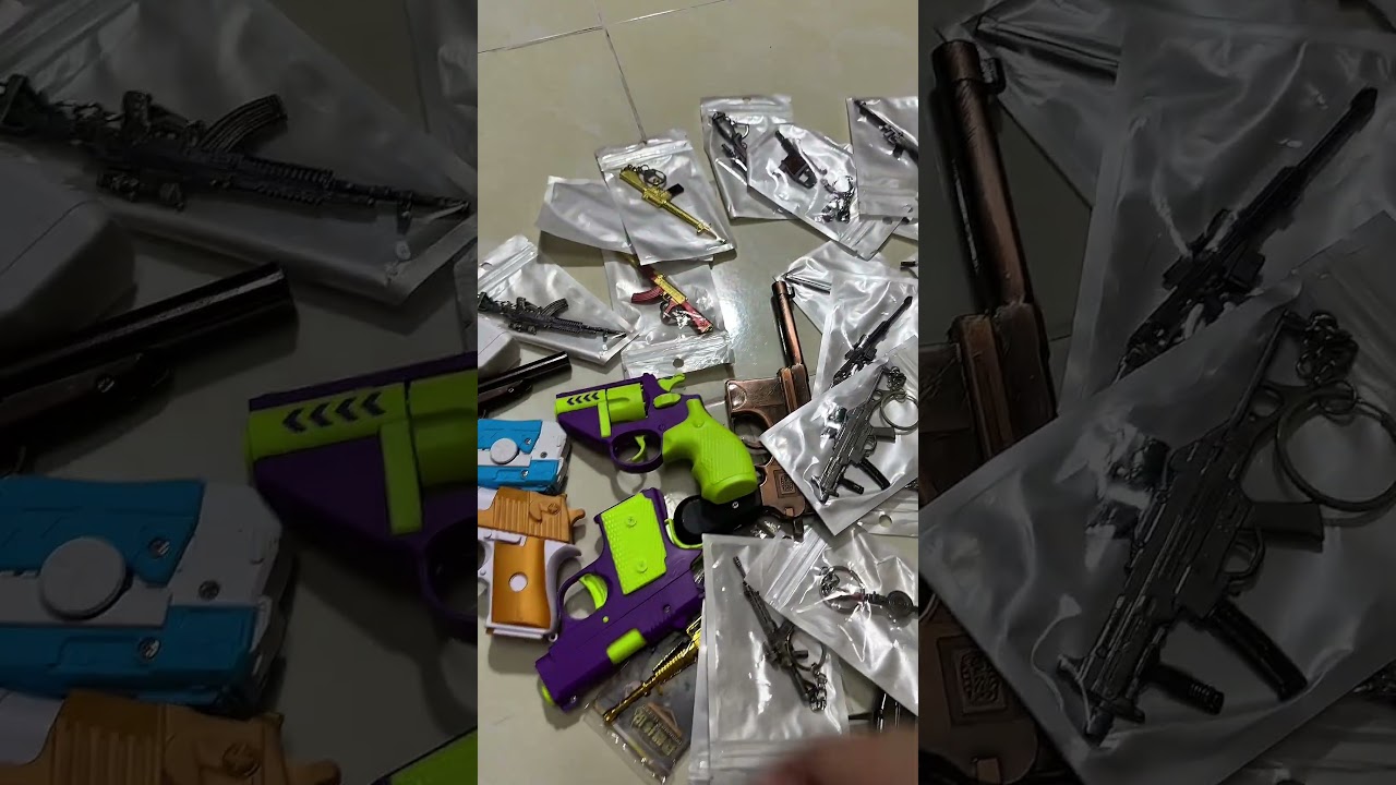 Золотистая модель пистолета MP5 за 1 доллар против золотой модели автомата АК-47 за 3 доллара.