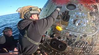 Raw Video U.s. Navy Dive Medical Team Open The Orion Spacecraft