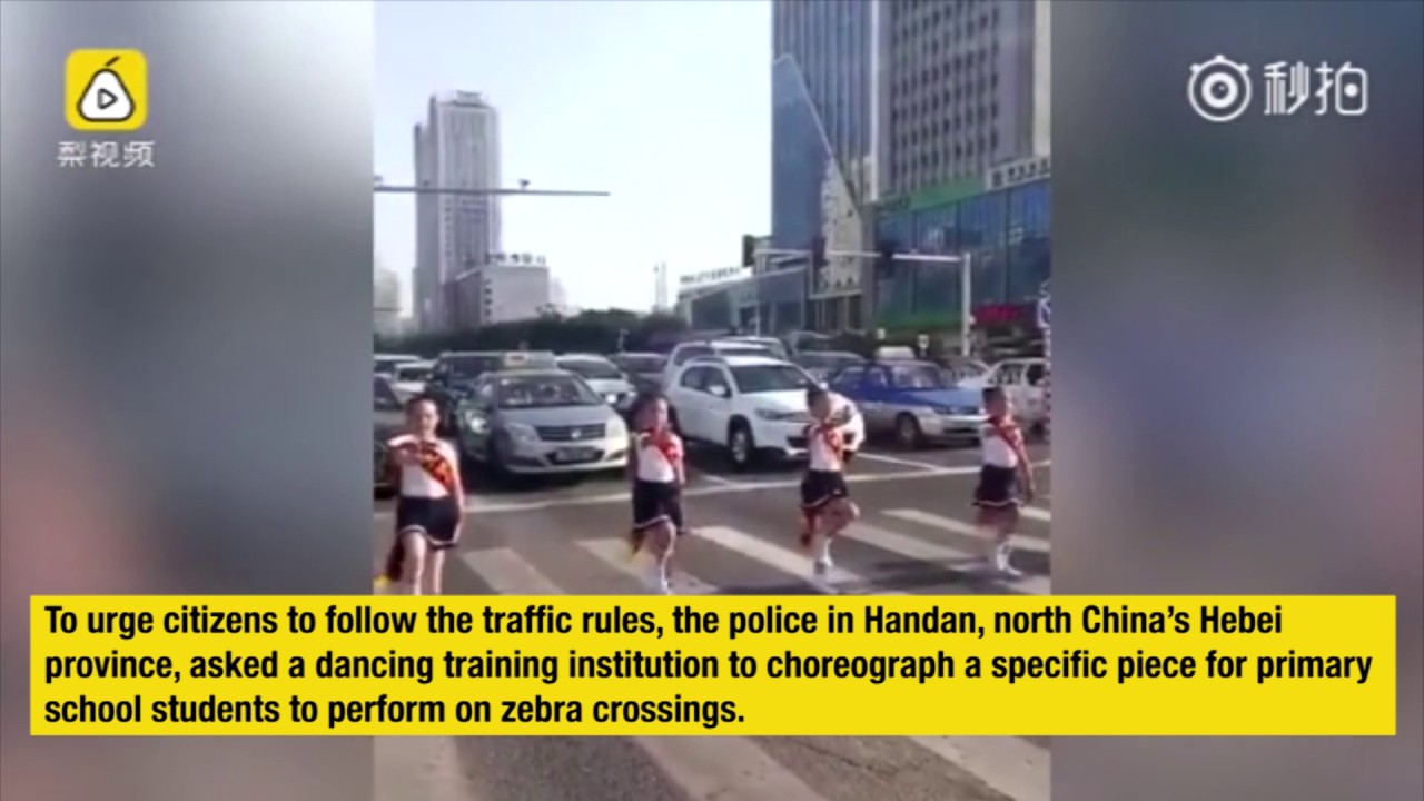 N. China’s traffic police launch safety campaign, with kids perform dancing on the crossroad
