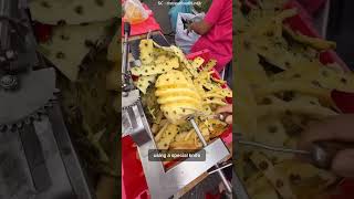 Peel Pineapples Like a Pro with This Effortless Tool!