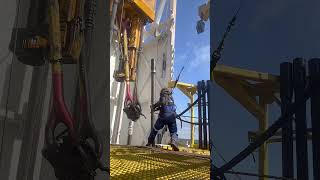 Pulling Out Drilling pipe Derrick man