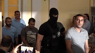 Suspects arrive at migrant death truck trial in Hungary