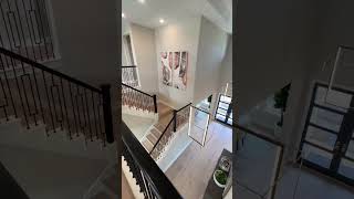 This home showcases a daring fusion of bold colors and eclectic patterns, creating a unique space