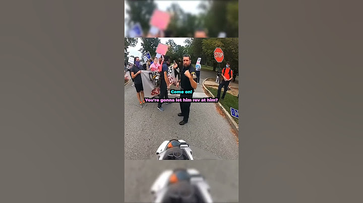 Protesters try to stop biker in the middle of the road 😱 @675kane