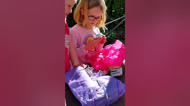 Erilyn opening gifts  from Jackie and annette