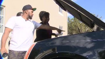 Video Extra: Man finds snake under car hood