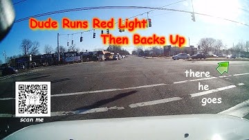 Dude runs Red Light, then Backs up (dash cam video)