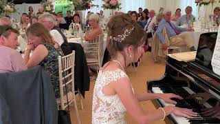 Bride surprises Groom with an attempt at Debussy's Clair de Lune