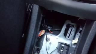 astra h obd2 connector location