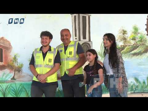 مركز بينوس والفنانة كلستان بوزو يرسمون جداريات على جدران إحدى المدارس مع أطفال عفرين