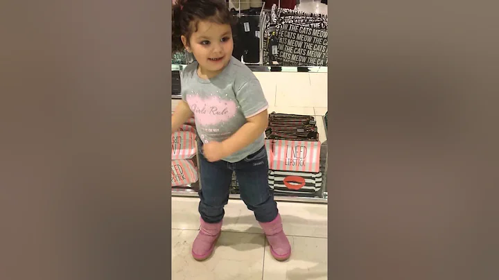 Baby dancing in the mall
