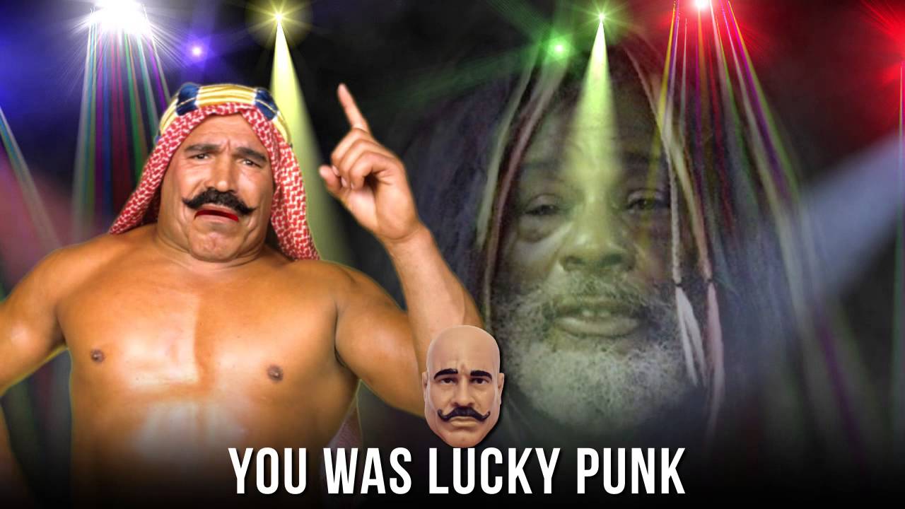 The Iron Sheik sings Put You in the Camel Clutch @OpieRadio - YouTube.