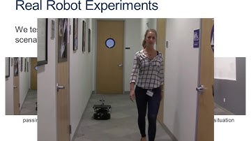 Time Dependent Planning on a Layered Social Cost Map for Human-Aware Robot Navigation