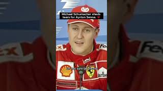 Michael Schumacher sheds tears for Ayrton Senna in a press conference.