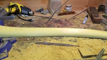 Tillering a sinew backed osage bow.