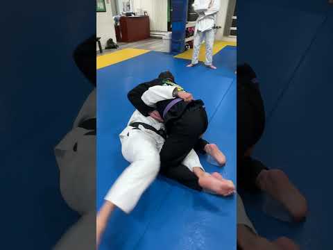 Knee bar from half guard shield