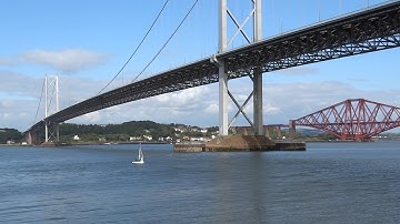 Dinghy Sailing Under Now Closed Forth Road Bridge Firth Of Forth Scotland