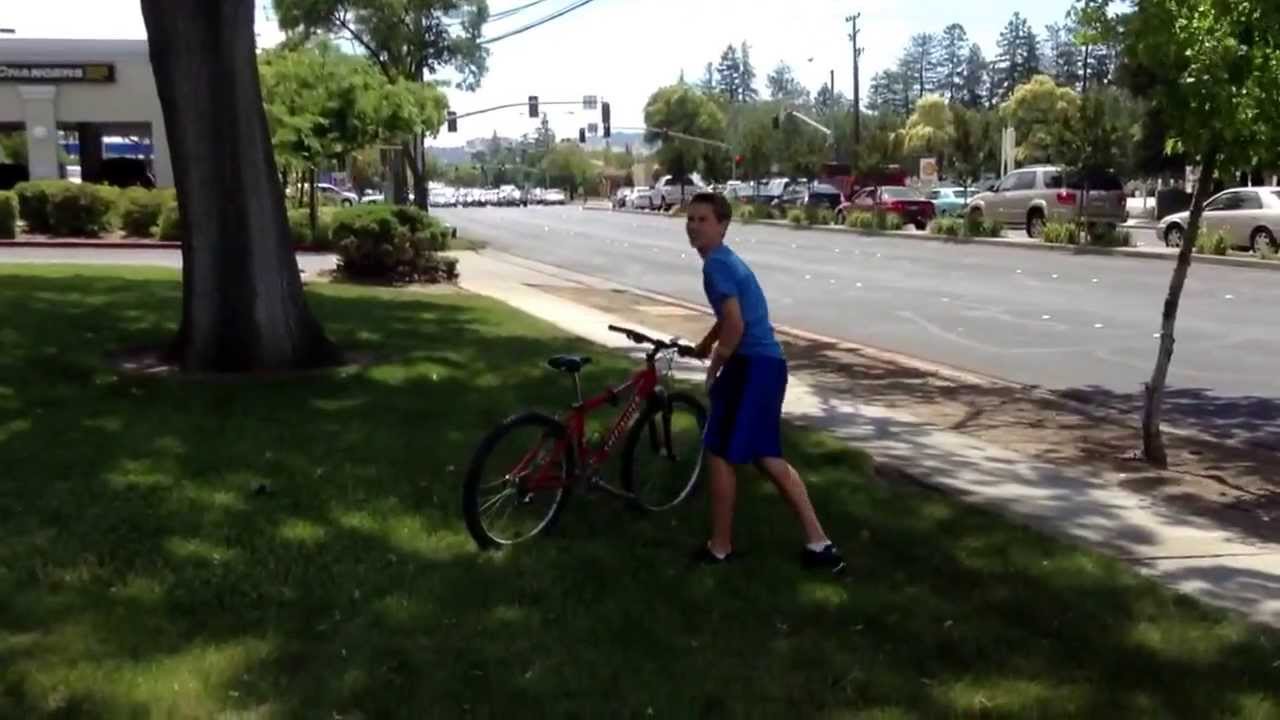 Guy hits balls on bike YouTube