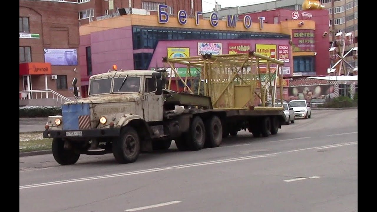 Краз с плугом