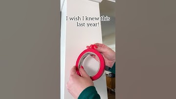 Use command hooks with painters tape to secure decorations & protect your walls! #garland #newyear