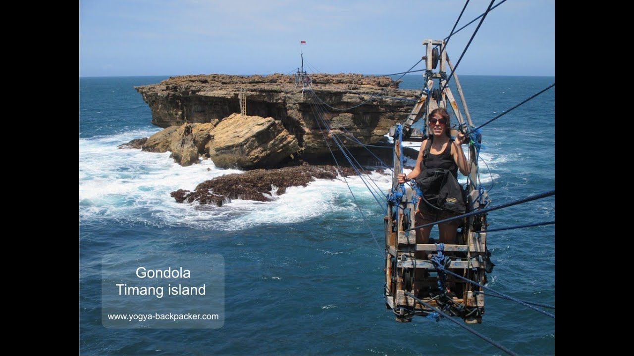 A Spanish girl across to Pantai  Timang  beach island by 