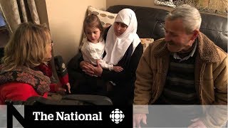 Syrian refugee family reunites with parents in Canada