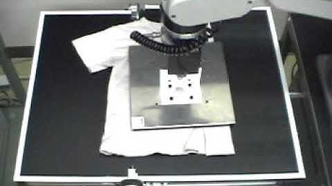 Dexterous manipulation of flexible objects by robot arm: Folding a cloth using some tools