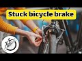 The simplest way to fix a stuck bicycle brake