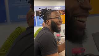 Man Receives a Large Canvas Portrait as Coworkers Laugh