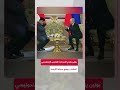 بوتين يساعد الرئيس الإندونيسي في وضع سماعة الترجمة بوتين يساعد الرئيس الإندونيسي في وضع سماعة الترجمة