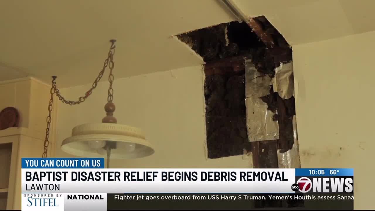 Volunteers work to provide relief after flood