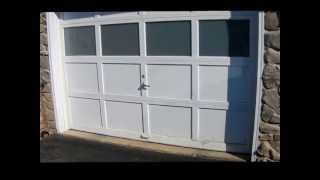 Replacing  bottom pannol on Garage Door