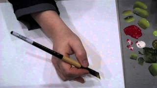 Tracy Moreau paints easy feathers with the Black Gold Wave Angle