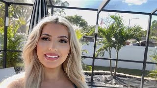 My Backyard With New Palm Trees, Sod, And Custom Rock Wall