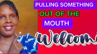 Pulling Something Out Of The Mouth Charity Munyua