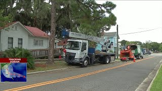 Crews scrambling to trim trees before Hurricane Dorian arrives