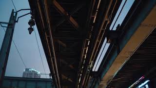 [AI] Experience the Subdued Glow of a Rainy Neon Monorail
