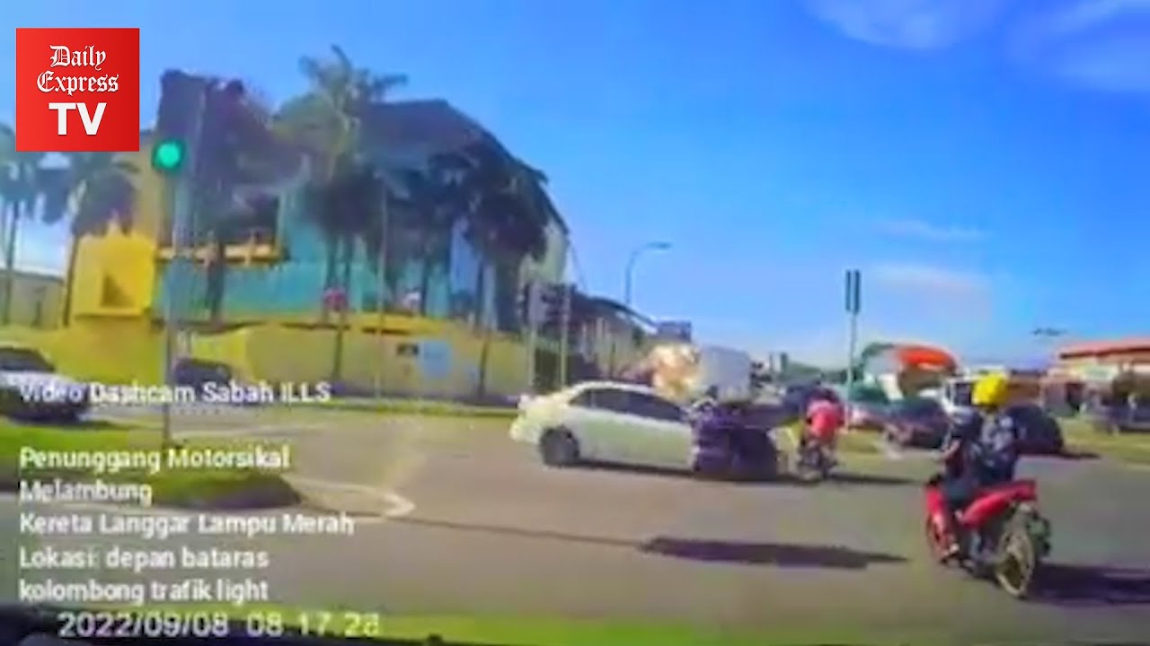 Car caught running red light, ramming into bikes - YouTube