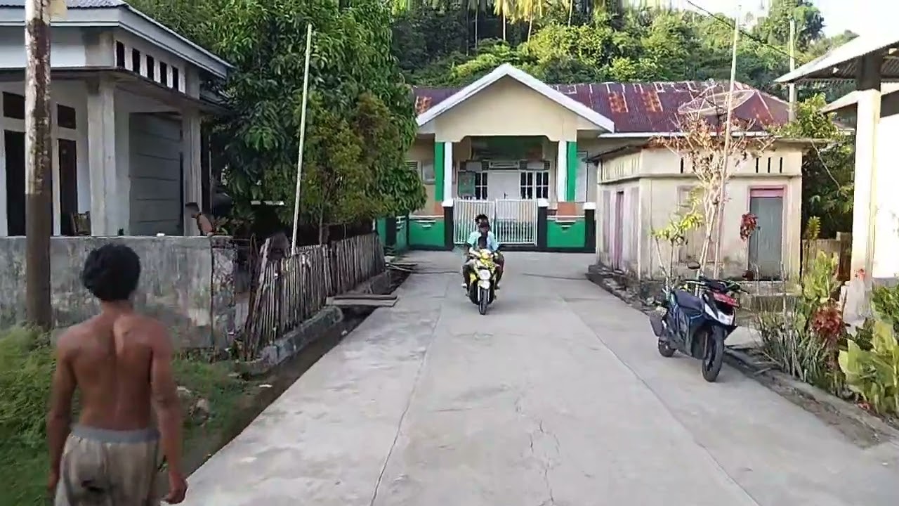 Suasana kampong Desa Busua.