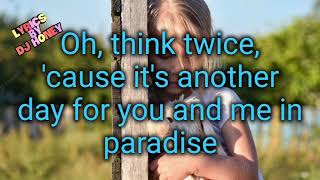 PHIL COLLINS---ANOTHER DAY IN PARADISE  LYRICS