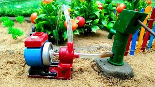 Watering the apple tree by setting up a water engine#tractor