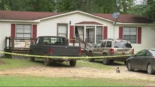 Teen charged in parents' shooting deaths