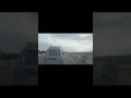 Amazing Journey Across the Bridge Beneath the Moody Sky!