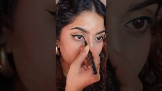 How To Ace That Winged Liner And Red Lips Combo Without Looking Like A