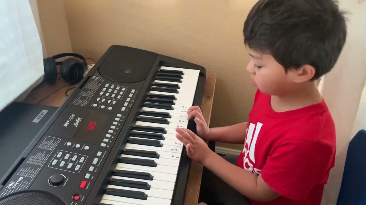 5 year old playing piano pianolessons YouTube